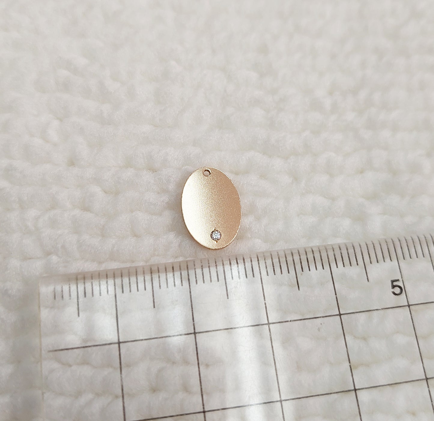 GF1309OVCZ Gold Filled (14KGF) 13 x 9.0mm Oval Tag 20ga (1.1mm hole) with CZ