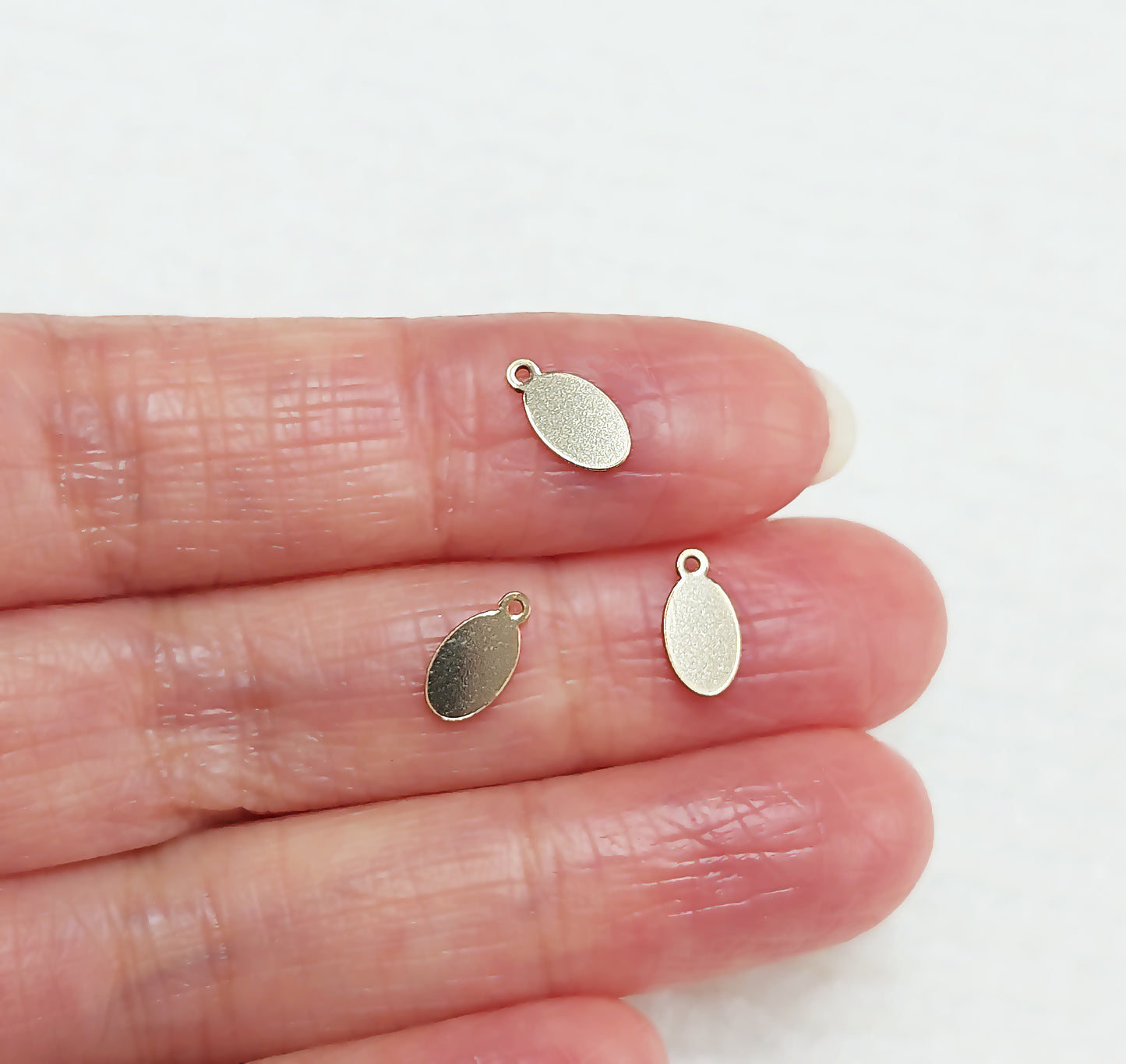 GF8544OV Gold Filled (14KGF) 8.5 x 4.4mm Oval Tag 24ga (No Mark)