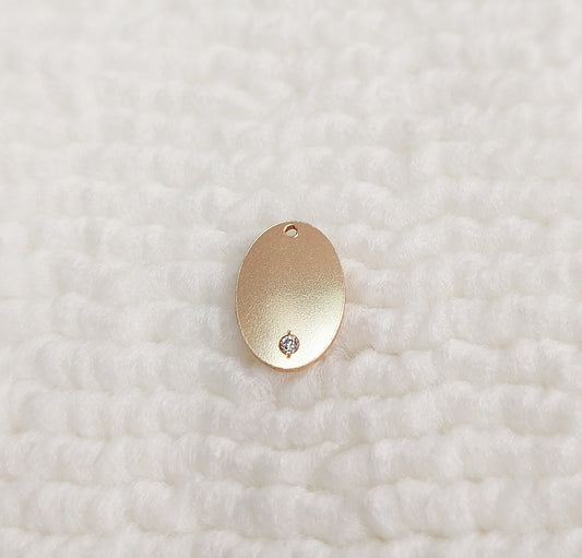 GF1309OVCZ Gold Filled (14KGF) 13 x 9.0mm Oval Tag 20ga (1.1mm hole) with CZ