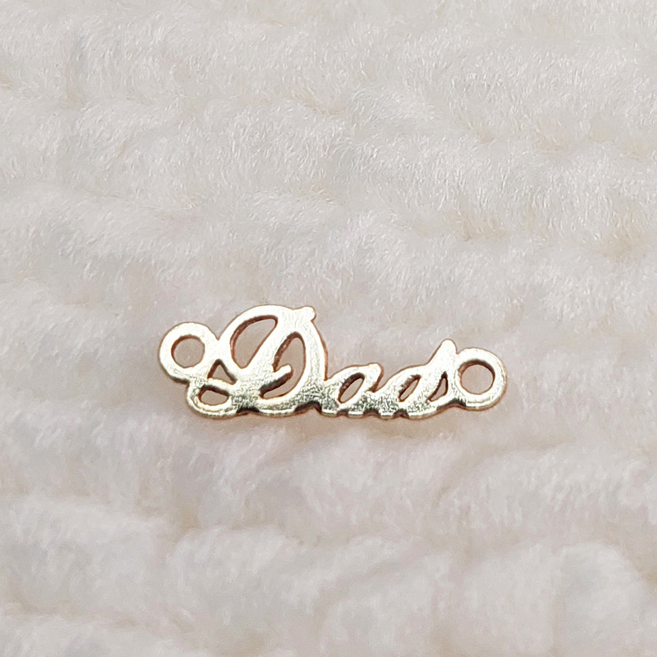 DA1036 Tiny Size Word "Dad" Connector 24ga