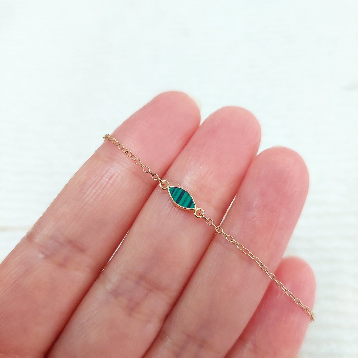 GF3MQR2MH / 93MQR2MH 3 x 6mm Synthetic Malachite Marquise Bezel Connector With 2mm Closed Rings