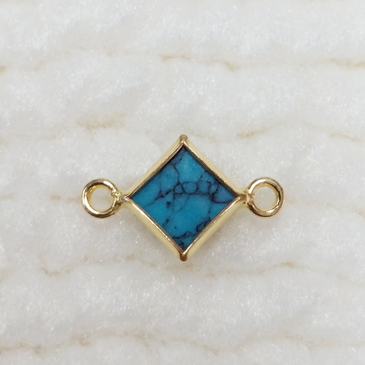 GF4DIAR2BBT / 94DIAR2BBT 4mm Synthetic Blue Turquoise Diamond-Shaped Bezel Connector With 2mm Closed Rings